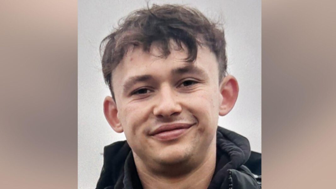 Murdo Morrison is a young man with dark hair it is wear a dark hooded top and jacket.