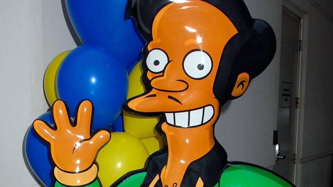 A mocked-up life size version of the Simpsons character Apu, seen smiling and waving. Picture taken in 2007