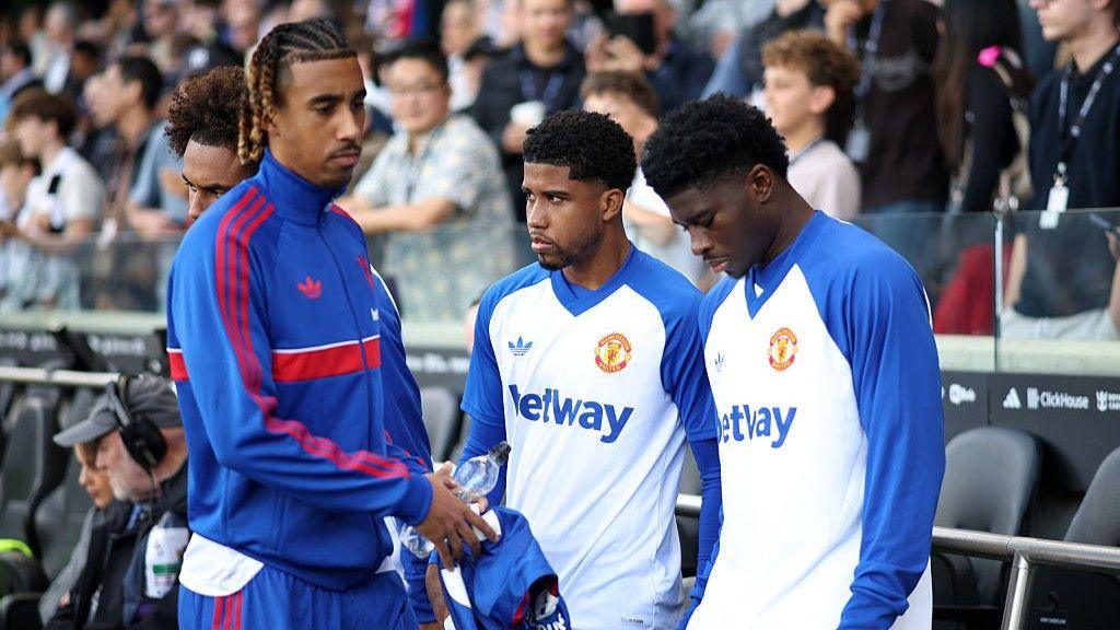 Former Lille team mates Leny Yoro (left) and Carlos Baleba (right) are back together at Manchester United