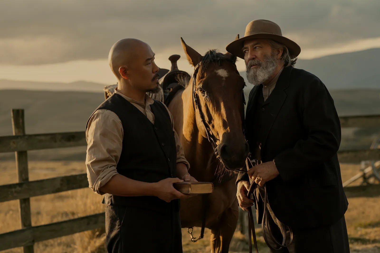 Image may contain Ciarn Hinds Hoon Lee Clothing Hat Adult Person Face Head Photography Portrait Animal and Horse