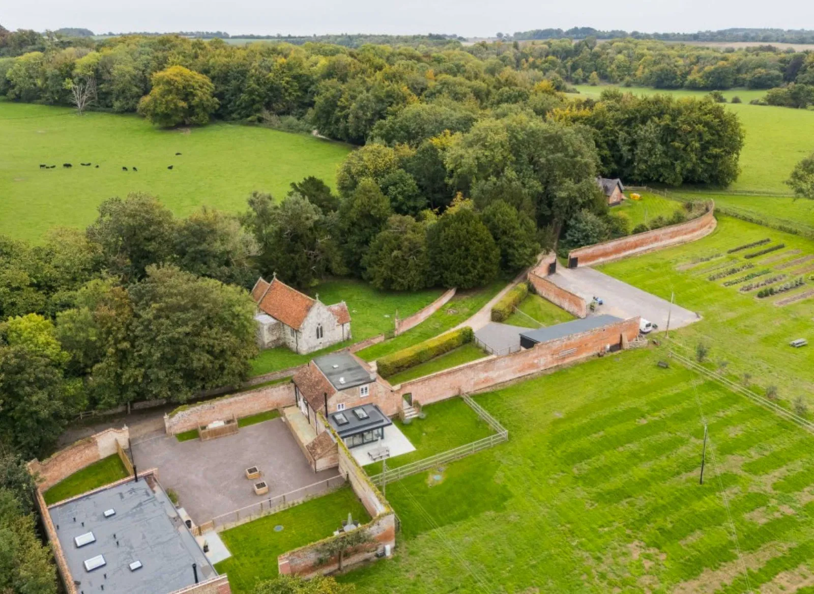 Image may contain Outdoors Architecture Building Housing House Driveway and Aerial View