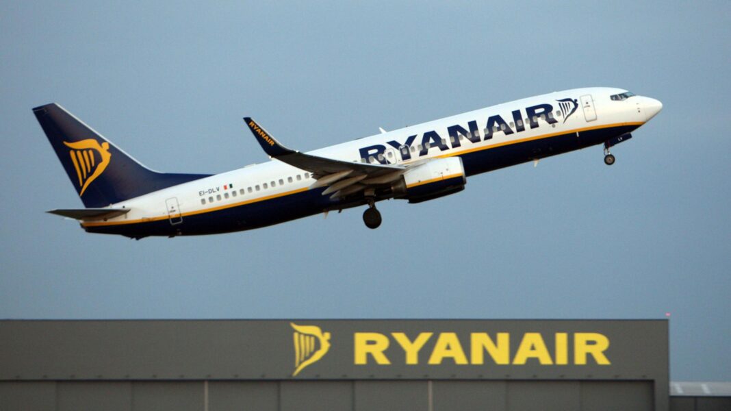 A Ryanair plane taking off from an airport