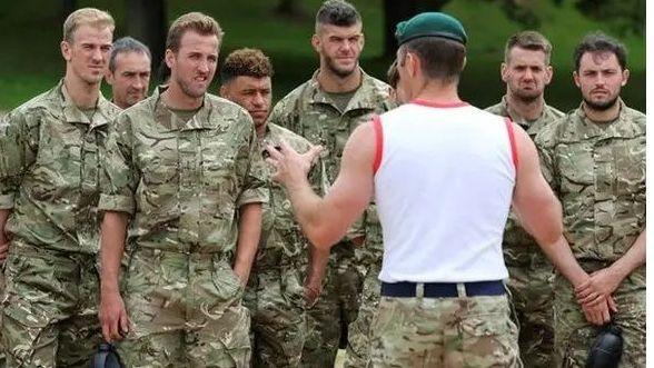 Joe Hart (far left) and Harry Kane (second left) were among the England players pictured who took part in a 48-hour boot camp designed for marine recruits at a Commando Training Centre in Devon