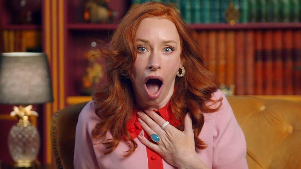 Hannah Fry sitting in the castle diary room on Celebrity Traitors