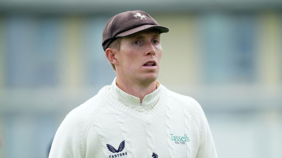 Zak Crawley walking on the pitch during a County Championship match for Kent in 2026