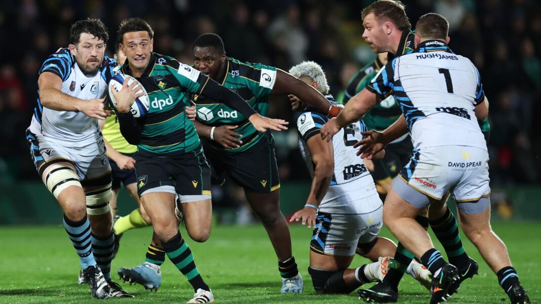 Alex Mitchell of Northampton Saints runs with the ball during his side's win against Cardiff