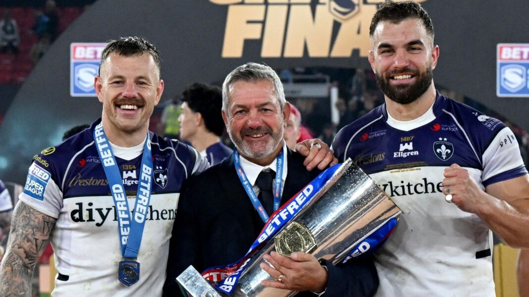 Tom Johnstone, head coach Daryl Powell and Mike McMeeken of Wakefield Trinity with the trophy