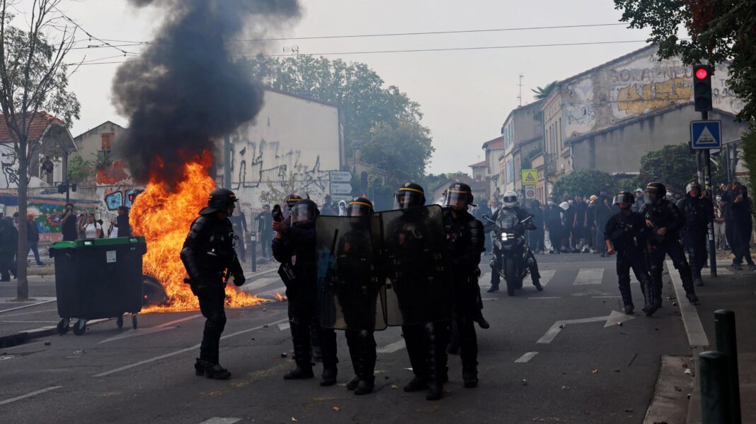 French CRS riot police stand in position amid clashes during a protest by high school students outside the Lycee Deodat-de-Severac high school as part of nationwide protests by high school students to demand the hiring of substitute teachers, increased resources and better learning conditions, in Toulouse as more than 400 schools remain closed following days of student protests that have escalated into violence in some places, France, October 2, 2026.