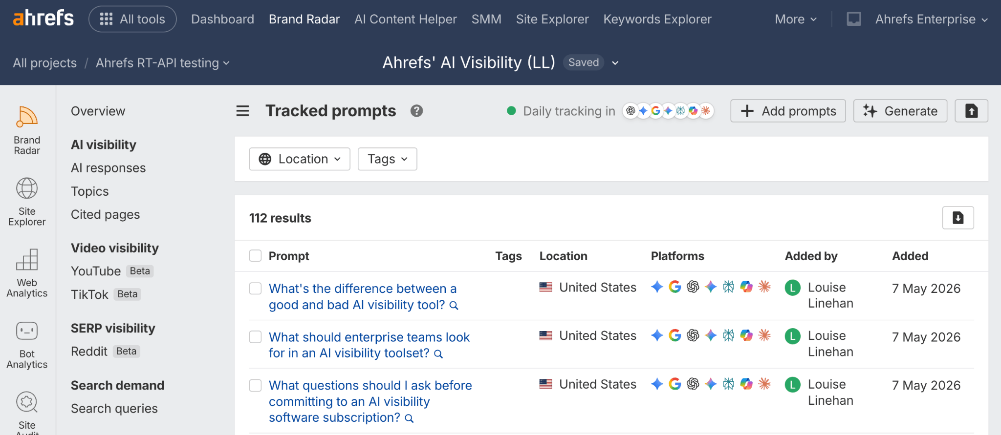 Ahrefs Brand Radar Tracked prompts report for the Ahrefs' AI Visibility (LL) project, listing 112 custom prompts tracked daily in the United States across AI platforms, such as What's the difference between a good and bad AI visibility tool?