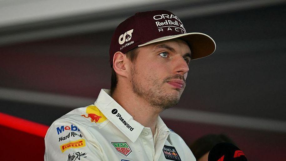 Max Verstappen answers questions in the media pen in Austin