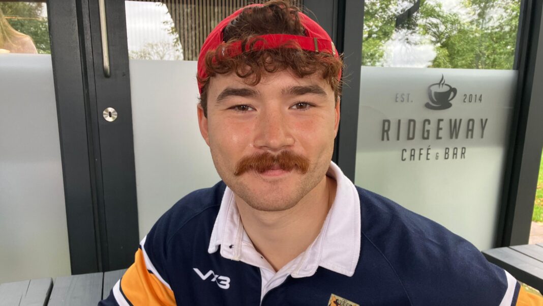 M4 junction closures and new Menai bridge in plans to tackle congestion on Welsh roads A head and shoulders shot of a man looking at the camera. He has a red cap on backwards and short, curly brown hair.