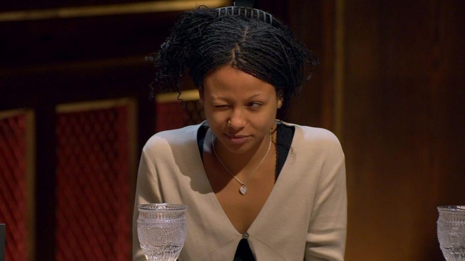 Myha'la winking at the round table at Richard E Grant