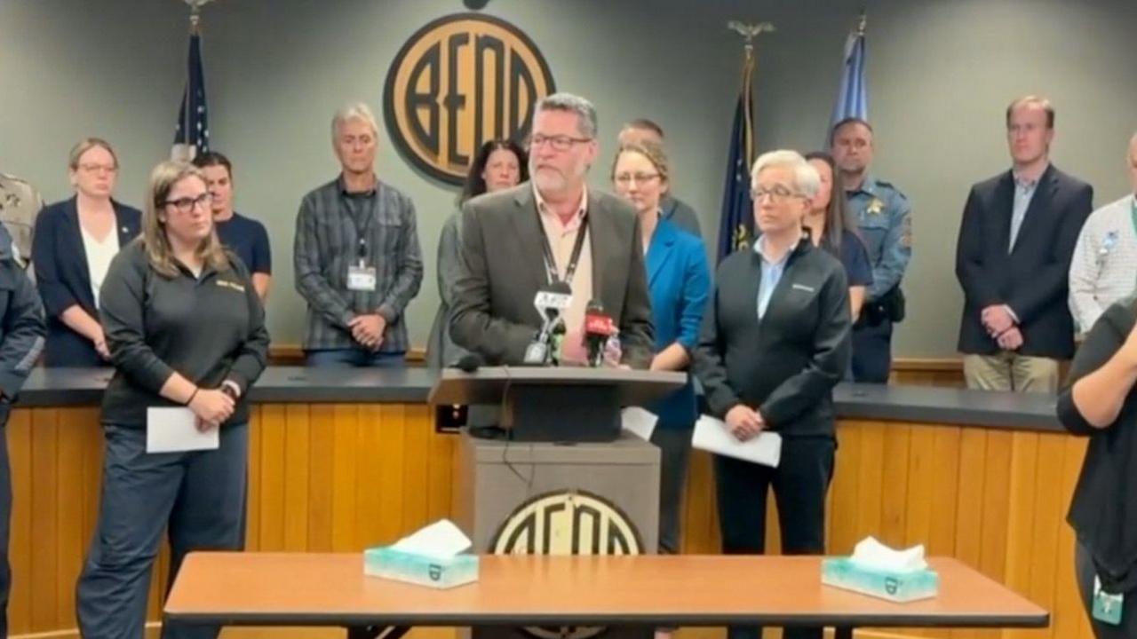 Steven Cook, school superintendent at a lectern