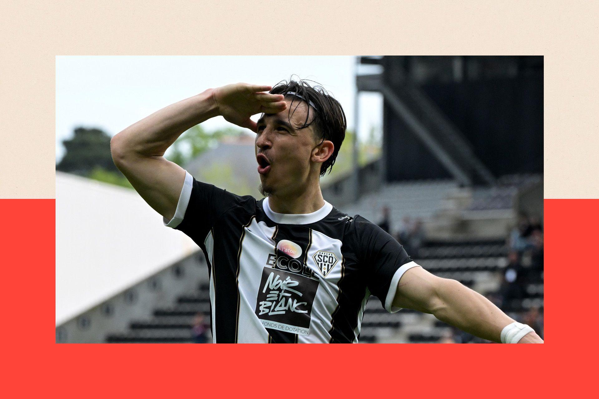Angers' French forward #19 Esteban Lepaul celebrates after scoring a goal during the French L1 football match between Angers SCO and Montpellier HSC at the Raymond-Kopa stadium in Angers, western France, on April 13, 2025