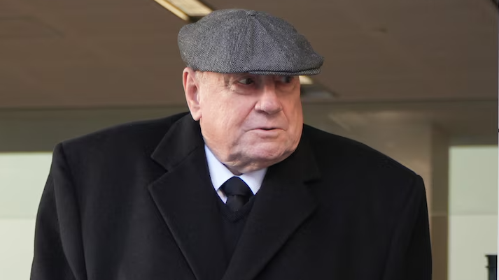 Christopher Saunders picture wearing a grey cap and black coat