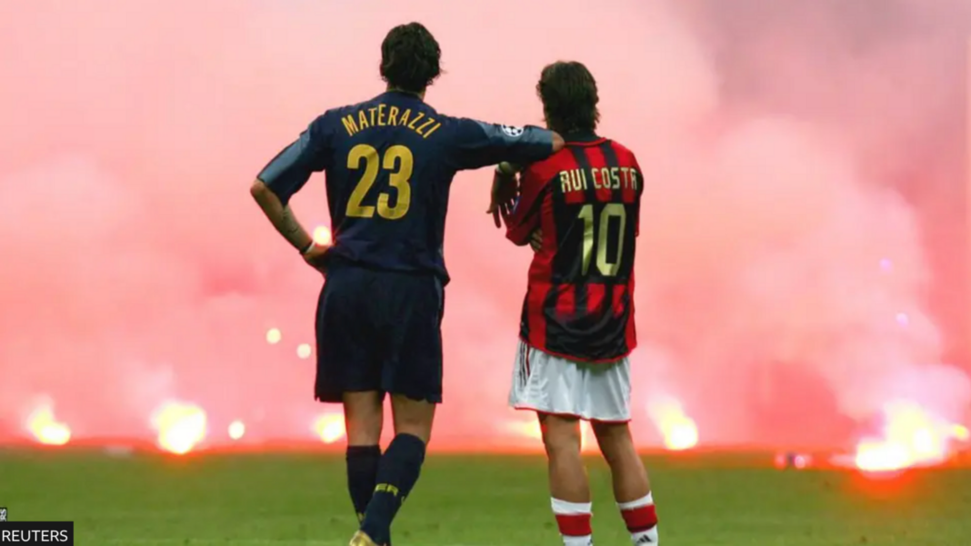 AC Milan v Inter and the tale of an iconic image Inter's Materazzi leans on Milan player Rui Costa's shoulder