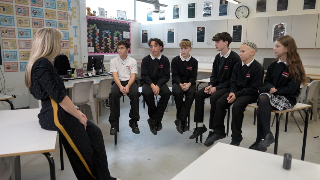 Schools should recognise antisemitism as distinct form of harm, review says Several pupils in uniform at Yavneh College speak to Judith Moritz about their security concerns
