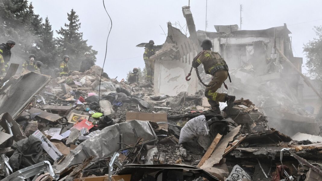 Russian glide bomb attack on Zaporizhzhia kills at least 15 people including three children Rescuers work at a site of an apartment building damaged during a Russian air strike, amid Russia's attack on Ukraine, in Zaporizhzhia,