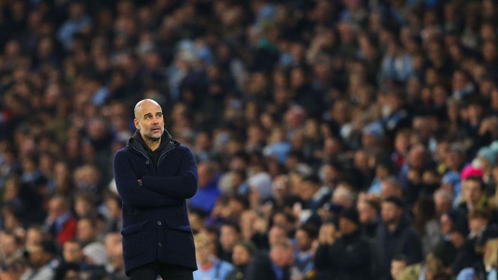 Pep Guardiola looks on during Manchester City's 3-1 victory over Aston Villa in the Premier League in February 2023