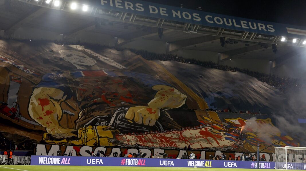Barca condemn PSG tifo inciting ‘violence and hatred’ A colourful banner featuring a man holding a bloody chainsaw