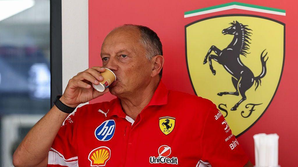 Fred Vasseur drinks a coffee while in the paddock in Malaysia