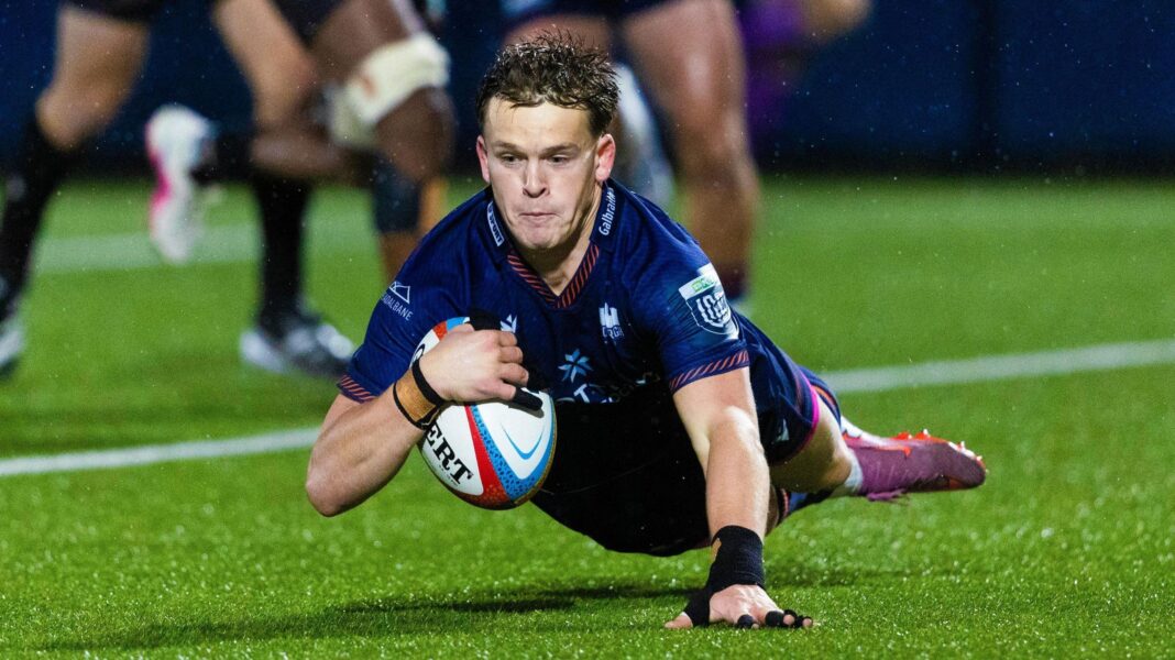 Edinburgh scrum-half Hector Patterson dives over the line to score a try against Lions in the United Rugby Championship
