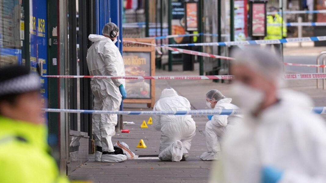 Forensic officers in Angel Row, Nottingham