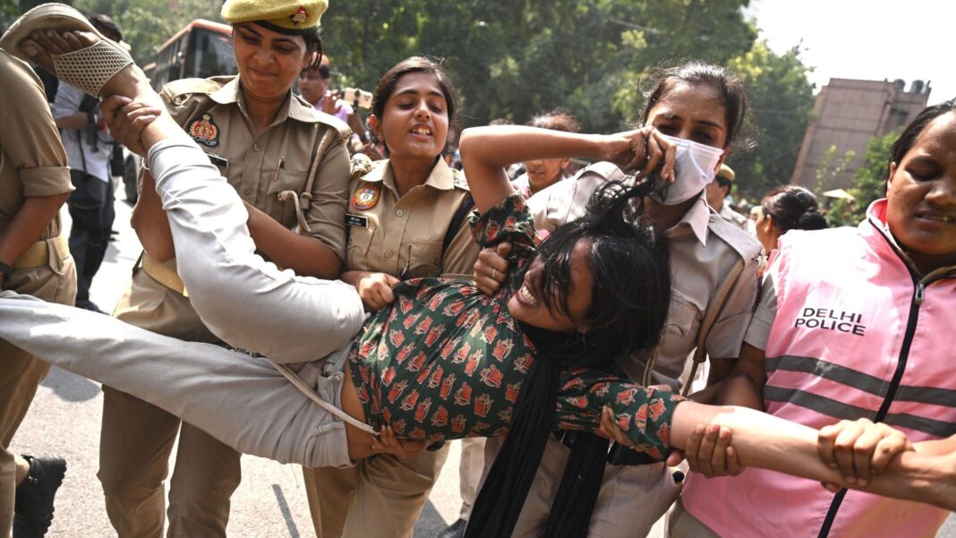 India’s ‘cockroach’ protesters set to return despite police crackdown Police personnel detain a supporter of the Cockroach Janata Party (CJP) during a protest demanding the resignation of India's Chief Election Commissioner Gyanesh Kumar over alleged voter roll irregularities linked to the "special intensive revision" (SIR), in New Delhi on October 10, 2026.