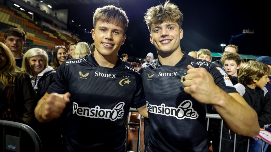 Charlie and Jack Bracken pose for a portrait in Saracens kit