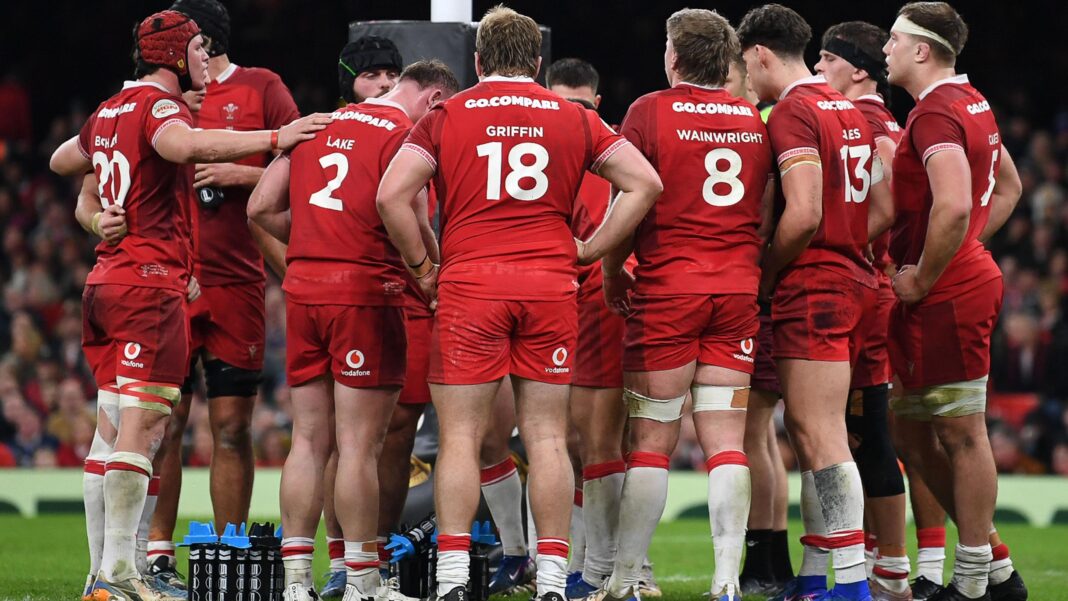 Wales counting down the year until World Cup Wales men's players in a huddle