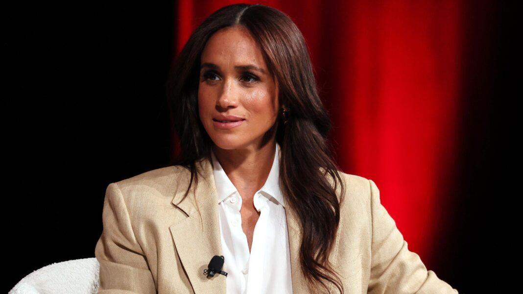 Meghan says she was informed about ‘disturbing allegations’ against her father in 2018 Meghan, the Duchess of Sussex sat down on a white chair wearing a beige suit and white shirt