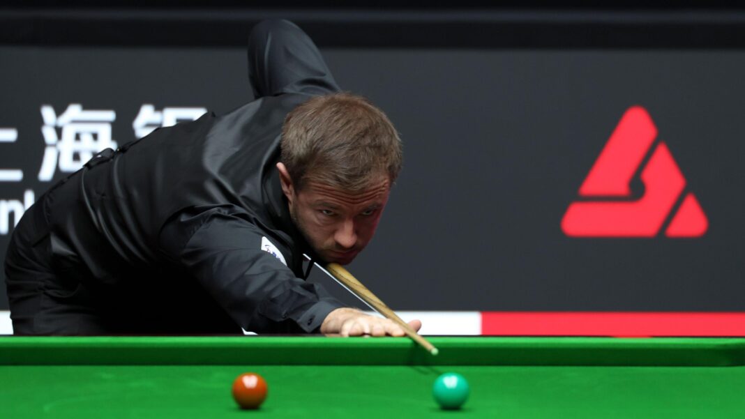 Selby out but Lisowski advances in NI Open defence Jack Lisowski after taking a shot