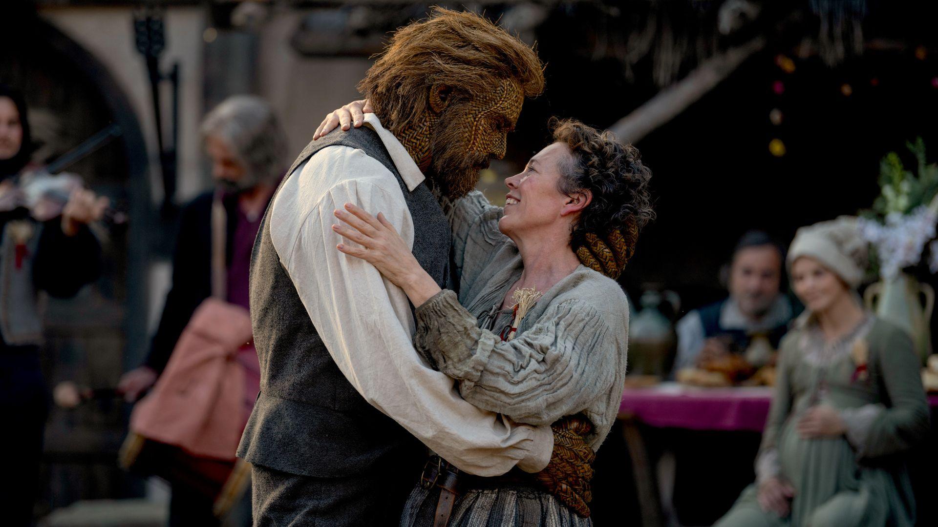 A picture of Olivia Colman as a fisherwoman, hugging Alexander Skarsgård as the Wicker husband in the film "Wicker"