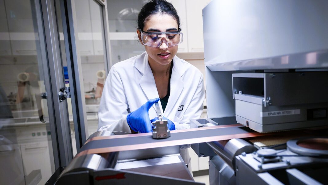 A worker at a battery research facility in Germany