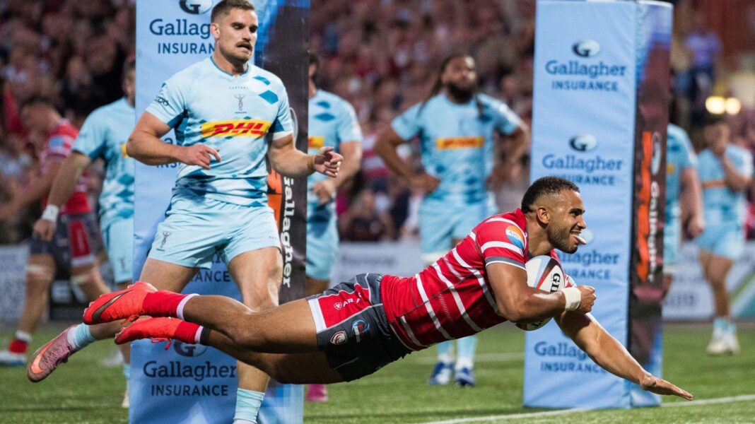 Will Joseph of Gloucester Rugby dives over to score a try against Harlequins
