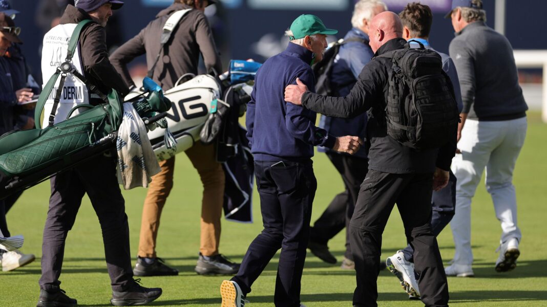 Desmond targeted by Celtic fan protest at Alfred Dunhill Dermot Desmond being escorted off the golf course by security