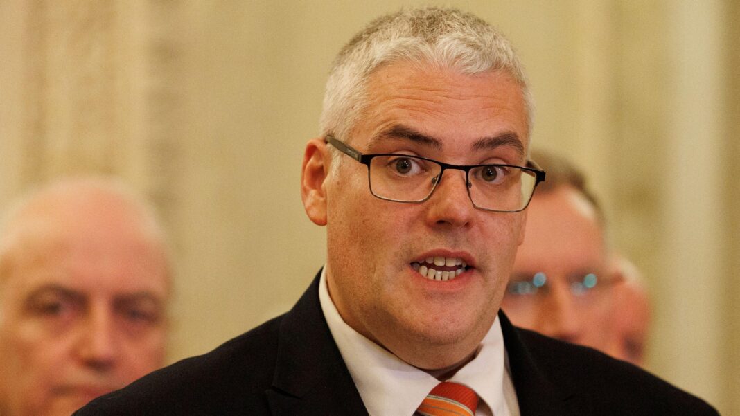DUP leader ‘hopes’ Carla Lockhart will not leave party A man with white hair and glasses, he is wearing a suit