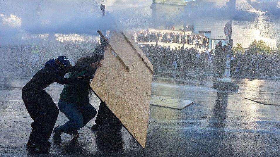 Police use a water cannon against a protester at a demonstration at Bastille by the student protest movement in Paris, France, on October 8, 2026.