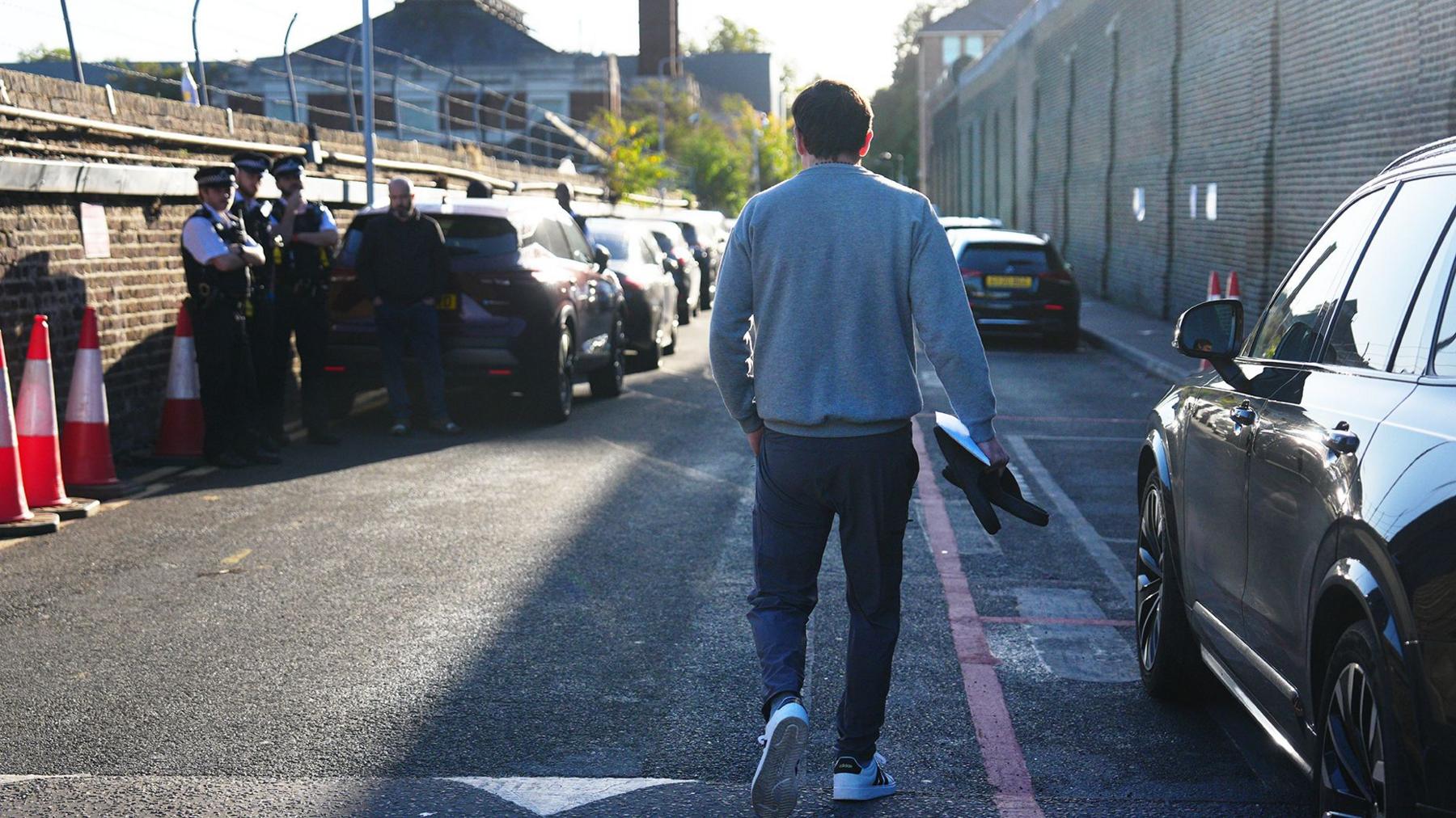 A man walks down the driveway of Brixton prison in south London.