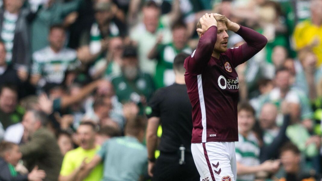 Can Hearts prove credentials at scene of title heartbreak? Hearts defender Stephen Kingsley pictured dejected at Celtic Park