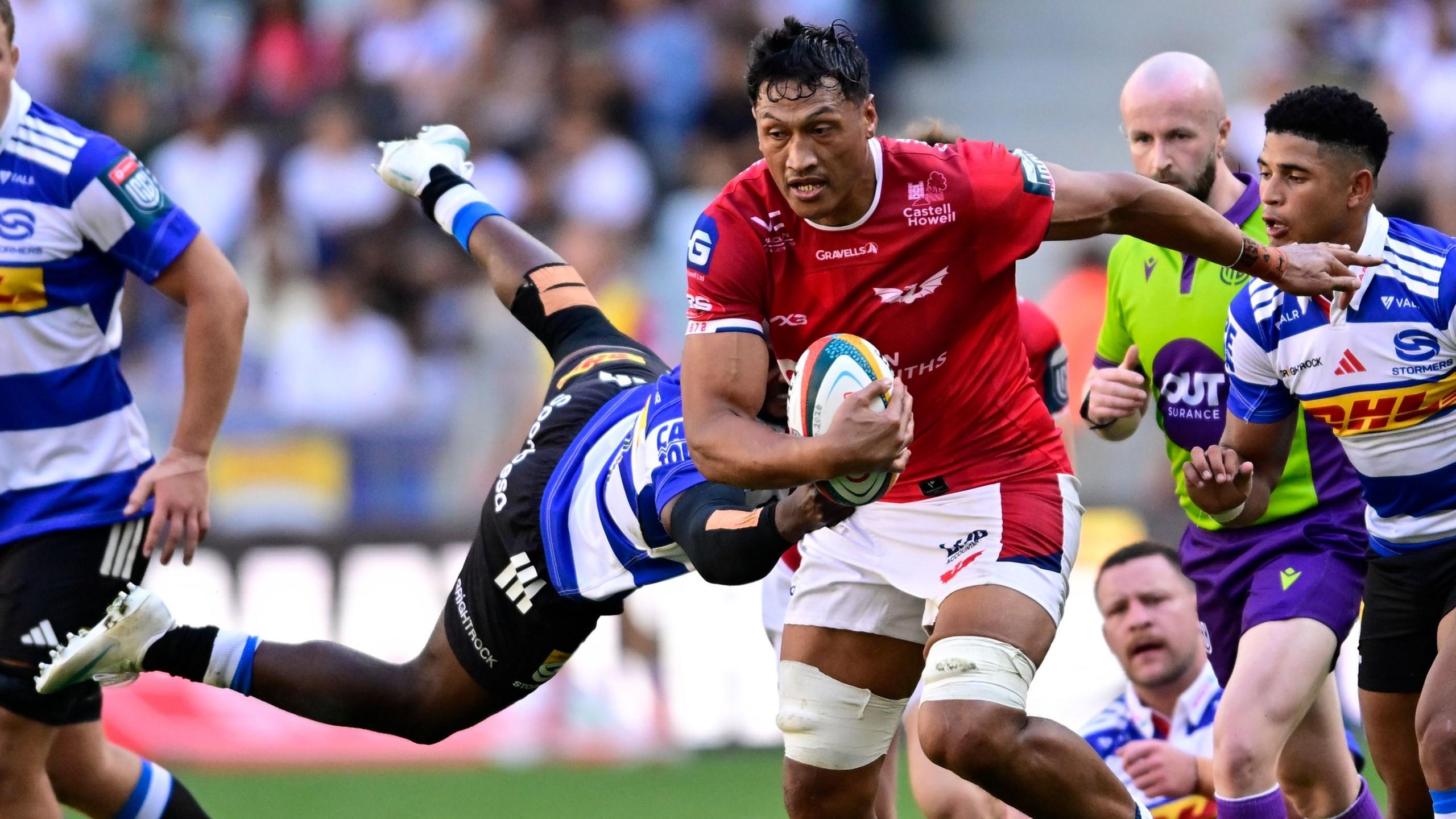 Sam Lousi carries the ball for Scarlets at Stormers