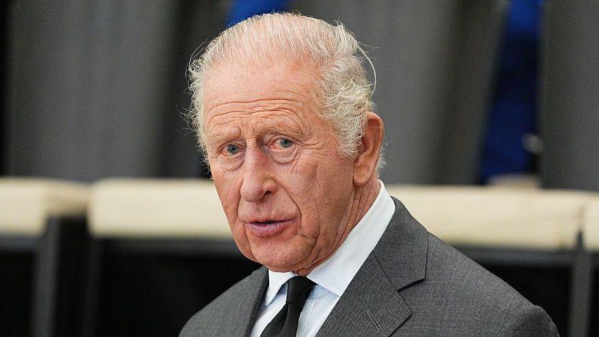 King Charles III in a grey suit pictured October 21, 2026