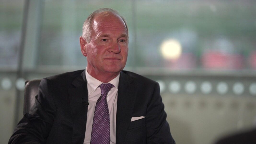 Not building third runway would be ‘huge missed opportunity’, warns Heathrow boss Thomas Woldbye, the boss of Heathrow Airport, sitting and talking, wearing a light coloured shirt, a dark coloured jacket and a purple tie.