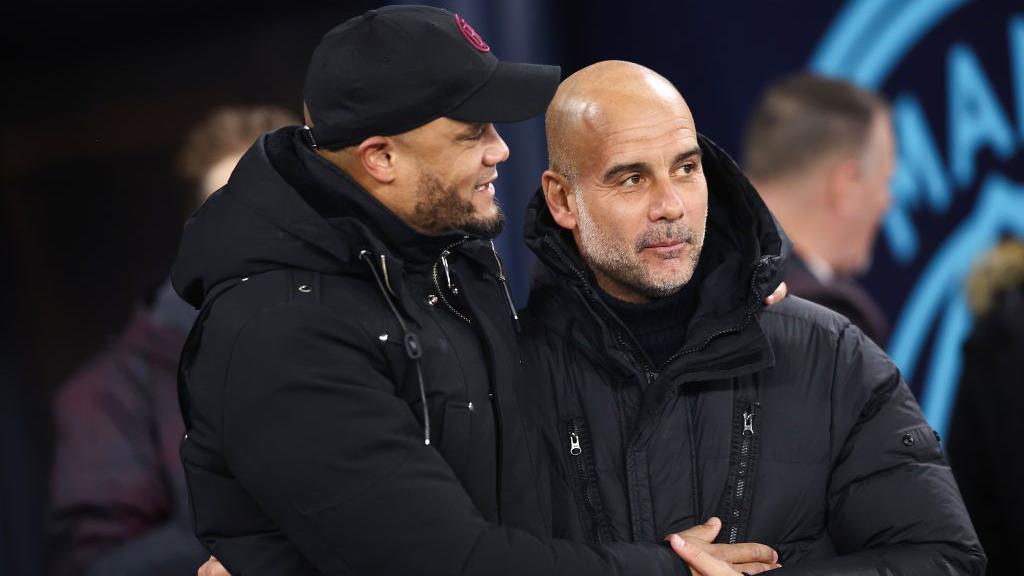Burnley manager Vincent Kompany and Manchester City manager Pep Guardiola during the Premier League match between Manchester City and Burnley FC at Etihad Stadium on January 31, 2024