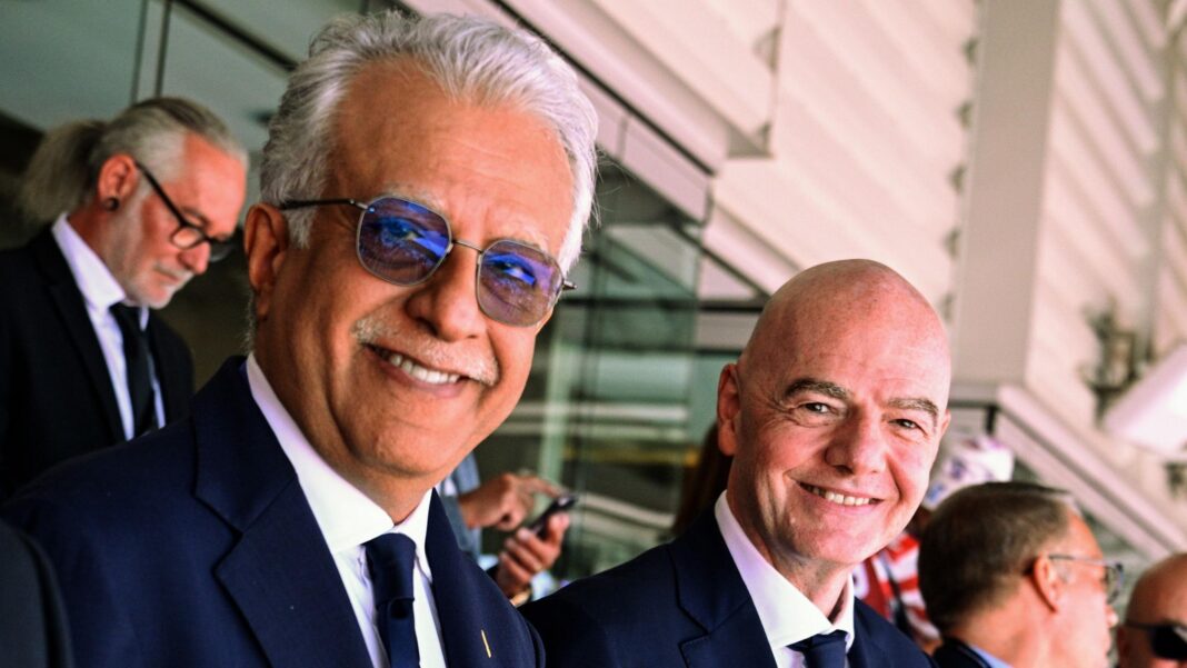 Infantino re-election hopes boosted by Asia support Sheikh Salman bin Ibrahim Al Khalifa and Gianni Infantino stood next to one another in the stands of a football stadium, smiling and looking to their right towards the camera