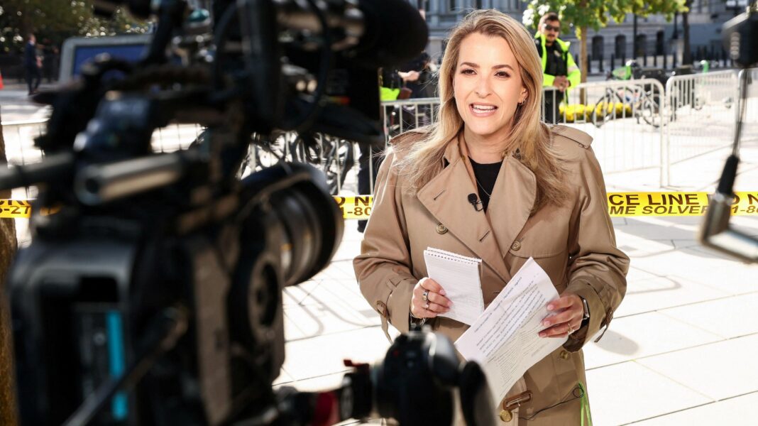 CNN White House correspondent Betsy Klein works near the White House, after reporters from CNN, Politico and MS NOW were barred from the White House on Thursday despite a judge's order calling for access to be restored immediately