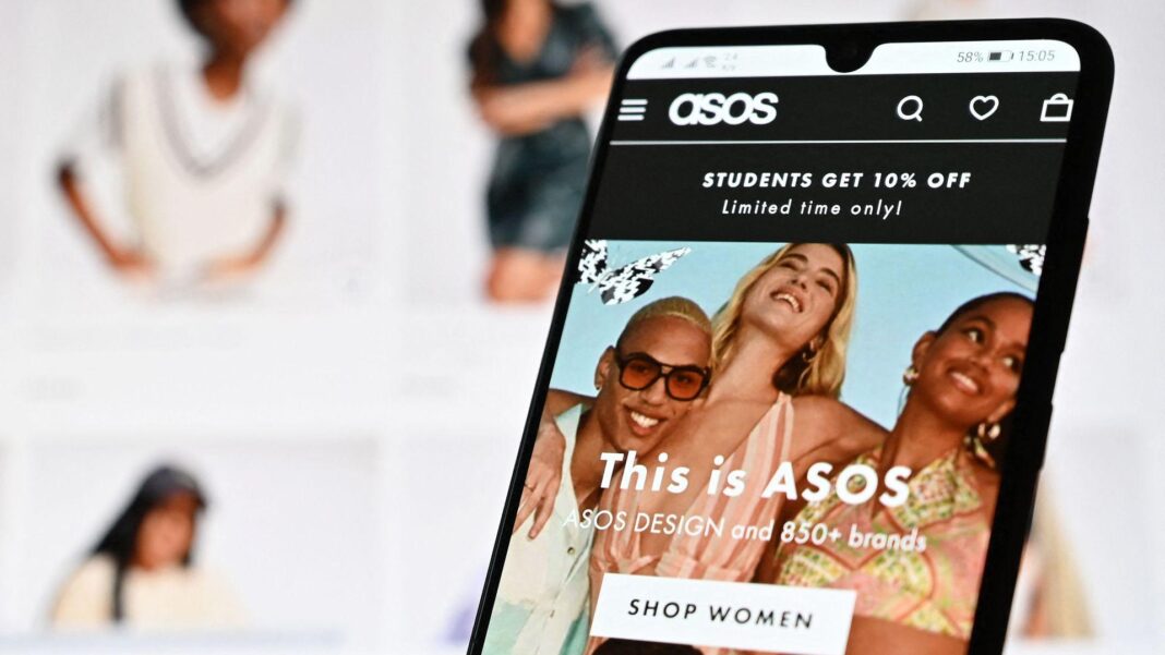 Phase Eight and Hobbs owner hit by cyber-attack, as H&M probes separate hack claim A laptop screen and mobile phone shows the website of online fashion retailer ASOS on August 12, 2021. (