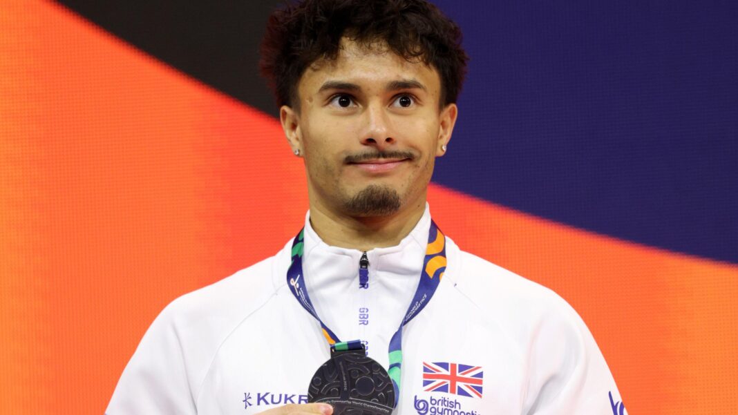 Jarman claims historic second silver at Worlds Jake Jarman celebrates winning floor silver at the World Gymnastics Championships