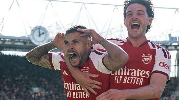 Bruno Guimaraes celebrates scoring his second Arsenal goal with Declan Rice celebrate.