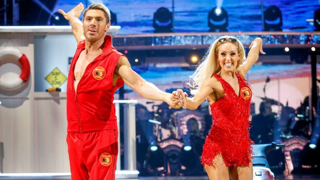 Welsh government and Labour strike budget deal with £60m for additional learning needs Amy Dowden and Chris Appleton during their appearance on the live show on Saturday 3 October for BBC1's Strictly Come Dancing. Dowden and Appleton wear red Baywatch outfits and are dancing hand in hand on the Stricty dancefloor. Amy has long blonde hair and a red sparkling short dress. Appleton wears a red waistcoat and red joggers and has blonde short hair. They both smile.